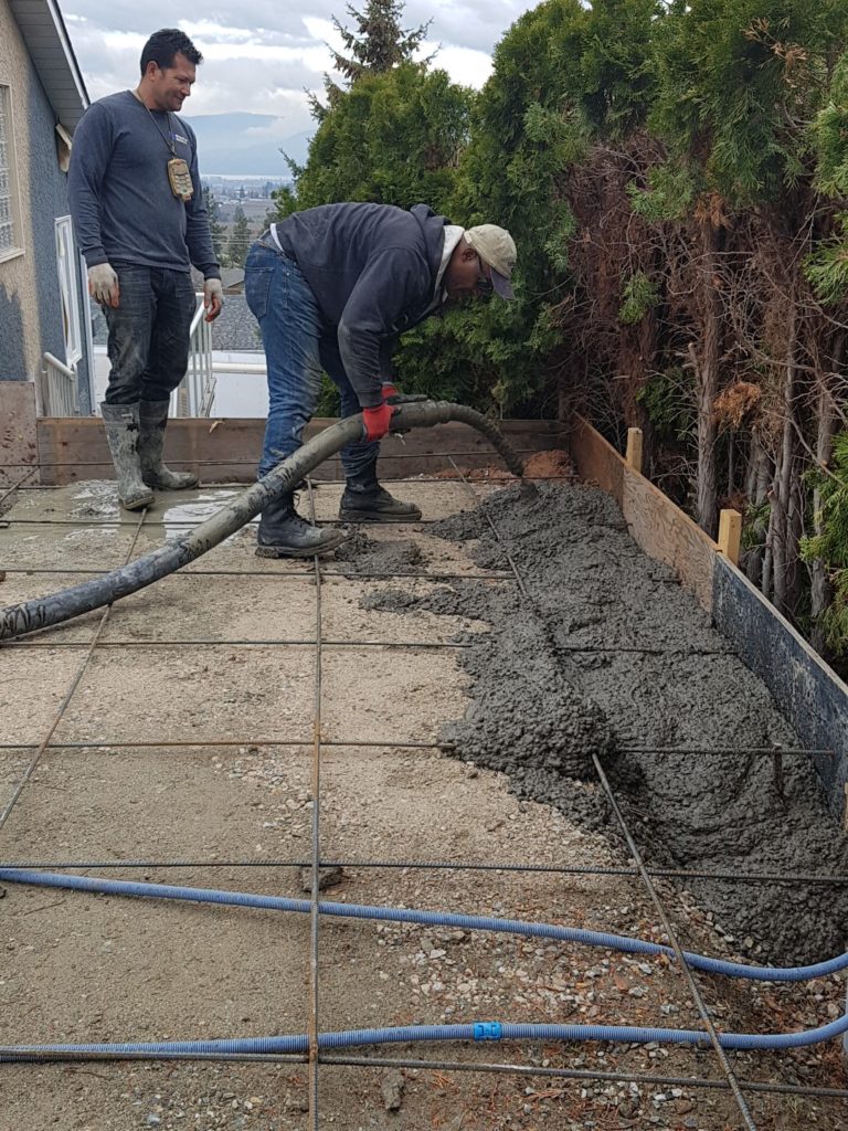 Pouring concrete Kelowna Concrete, Finishing, Repairs, Stamped